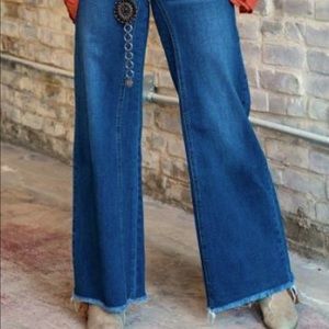 Wide legged denim blue jeans